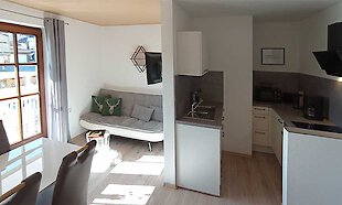 Wohnraum mit Küche in der Ferienwohnung 2